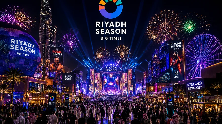Riyadh Season at night — the Sphere, fireworks and crowds across the boulevard.